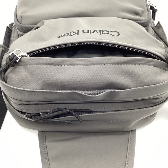 2042. Calvin Klein Gray Sling Bag NWT - Picture 5 of 9